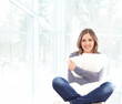 Young and beautiful woman on the sofa