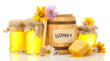 Sweet honey in jars and barrel with honeycomb, wooden drizzler