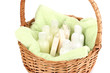 Hotel amenities kit in basket isolated on white