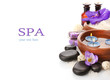 Beautiful spa setting with flowers, isolated on white