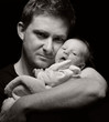 Father and his newborn baby.