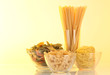 Different types of pasta on light background