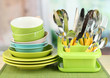 Plates, forks, knives, spoons and other kitchen utensil