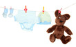 Baby clothes hanging on clothesline, isolated on white