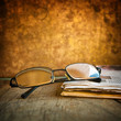 Rading glasses and newspaper