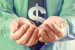 Photo: Dollar symbol in hands Dollar symbol in hands