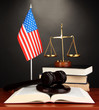 Wooden gavel, golden scales of justice  and books
