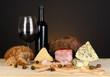 Exquisite still life of wine, cheese and meat products
