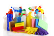 Different kinds of house cleaners and colorful sponges, gloves