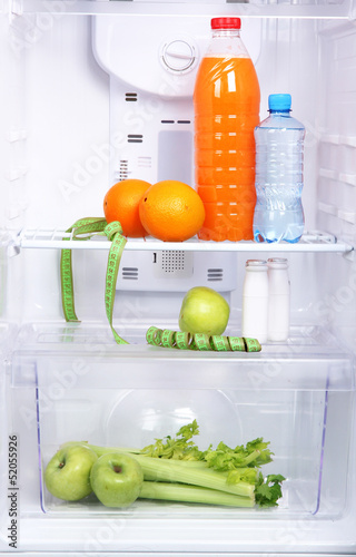 Photo: Open refrigerator with diet food Open refrigerator with diet food