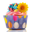 Photo: Pink cupcake with flower and letters Pink cupcake with flower and letters