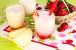 Delicious yogurts with fruits in glasses