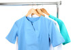 Medical clothing on hunger isolated on white