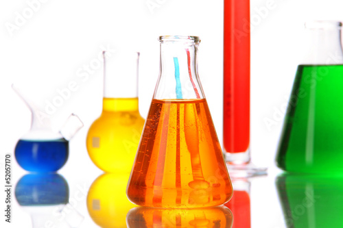 Photo: Test tubes with colorful liquids isolated on white Test tubes with colorful liquids isolated on white