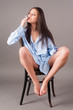 Photo: beautiful young brunette woman with cigarette beautiful young brunette woman with cigarette