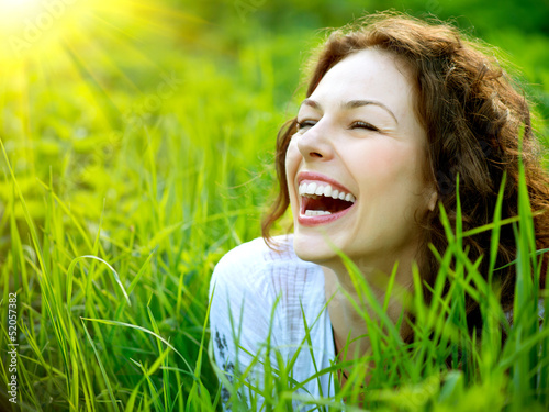 Photo: Beautiful Young Woman Outdoors. Enjoy Nature Beautiful Young Woman Outdoors. Enjoy Nature