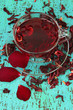 Herbal tea in glass cup, on color wooden background