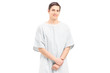 A male patient in a hospital gown