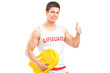 A happy lifeguard on duty giving a thumb up