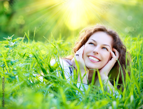 Photo: Beautiful Young Woman Outdoors. Enjoy Nature Beautiful Young Woman Outdoors. Enjoy Nature