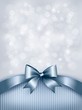 Vector: Holiday blue background with gift glossy bow and ribbon. Vector Holiday blue background with gift glossy bow and ribbon. Vector