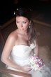 Foto: Bride' s portrait and wedding bouquet Bride' s portrait and wedding bouquet