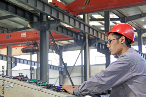 Photo: industrial workers in the production line industrial workers in the production line