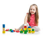 child girl playing with block toys over white background