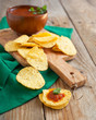 Photo: Tortilla chips served with a salsa sauce Tortilla chips served with a salsa sauce
