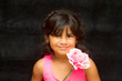 Girl posing with flower