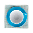 Coffee cup over kitchen towel