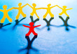 Paper people in teamworking concept