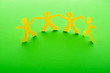 Paper people in teamworking concept