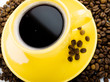 Photo: Coffee in an yellow cup Coffee in an yellow cup