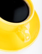 Photo: Coffee in an yellow cup Coffee in an yellow cup