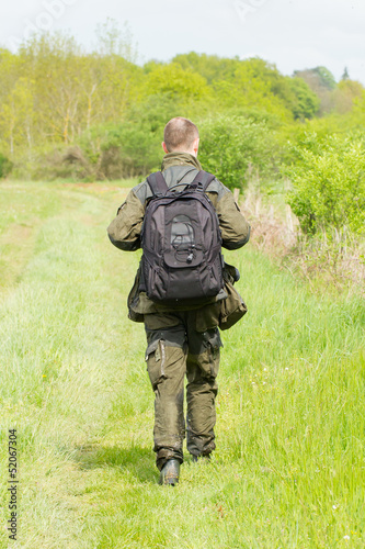 Photo: Wildlife photographer with long telephoto Wildlife photographer with long telephoto