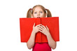 Foto: A little surprised girl with a book looking at camera A little surprised girl with a book looking at camera