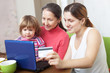 Happy family  paying by credit card in internet store
