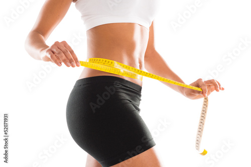 Photo: Woman Measuring Her Perfect Waist Woman Measuring Her Perfect Waist