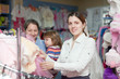 Photo: women of three generations at clothes store women of three generations at clothes store