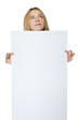 Teenage girl holding blank banner and looking up