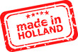 Red rubber stamp of made in holland
