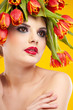 Foto: beauty woman portrait with wreath from flowers on head ogange b beauty woman portrait with wreath from flowers on head ogange b