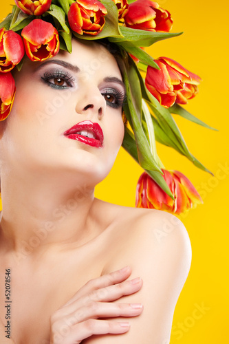Photo: beauty woman portrait with wreath from flowers on head ogange b beauty woman portrait with wreath from flowers on head ogange b