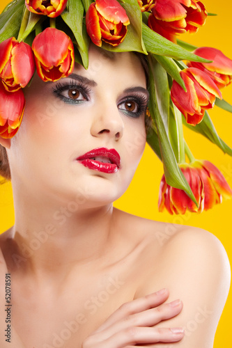Photo: beauty woman portrait with wreath from flowers on head ogange b beauty woman portrait with wreath from flowers on head ogange b