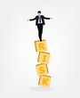 Man balance on risk box