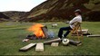 man chilling around camp fire wanlockhead scotland