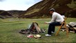 man sitting around camp fire wanlockhead scotland