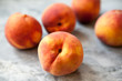 Peaches on a table