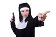 Nun with handgun isolated on white